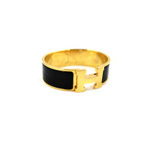 Hermès Bracciale Click H Metallo Nero e Oro