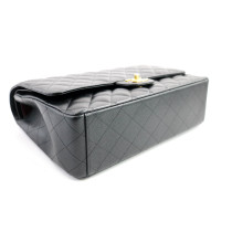 Chanel Classique Maxi Jumbo Cuir Caviar Noir