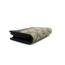 Gucci Portafoglio GG Beige e Pelle Nera
