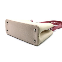 Louis Vuitton Capucines MM Taurillon Creme und Rosa