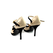 Prada Gold and Black Satin Pumps