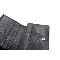 Gucci Portafoglio Marmont GG Supreme e Pelle