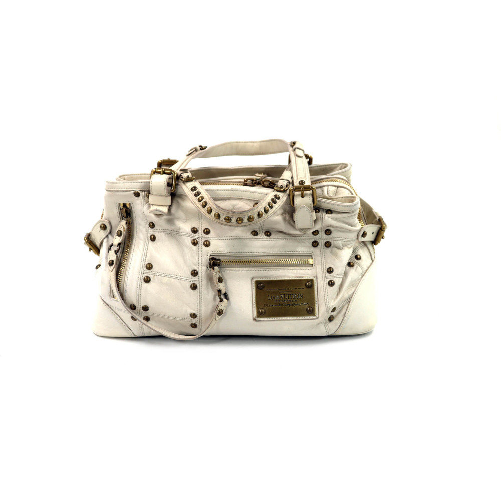 Louis Vuitton Riveting Limited Edition Pelle Panna